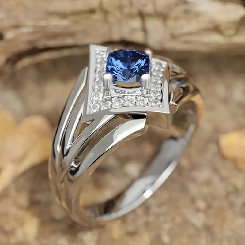 Huitan Mode-Ring für Damen, eingelegt, funkelnder blauer Zirkonia, spezielles Design, Party-Accessoires, silberfarben, täglicher schicker Schmuck
