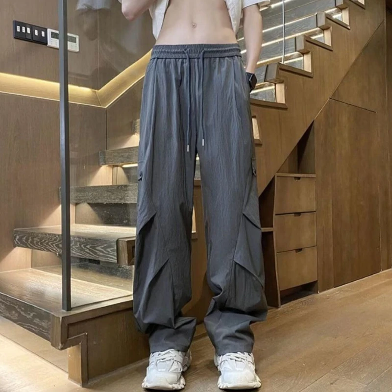 Męskie spodnie robocze szerokie cargo, dresowe, gładkie, tanie, nylonowe, w stylu koreańskim Y2k vintage streetwear, wysokiej jakości.