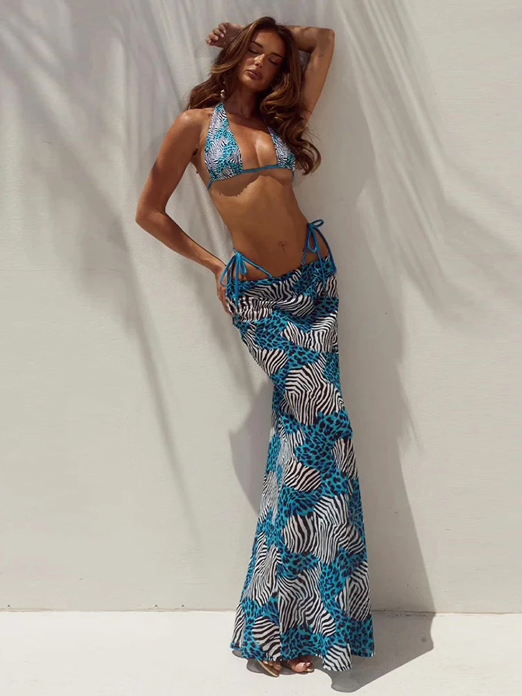 

Необычный купальник-тройка с леопардовым принтом: топ-бра на завязках, трусики и макси-юбка с эффектом пуш-ап для пляжного образа