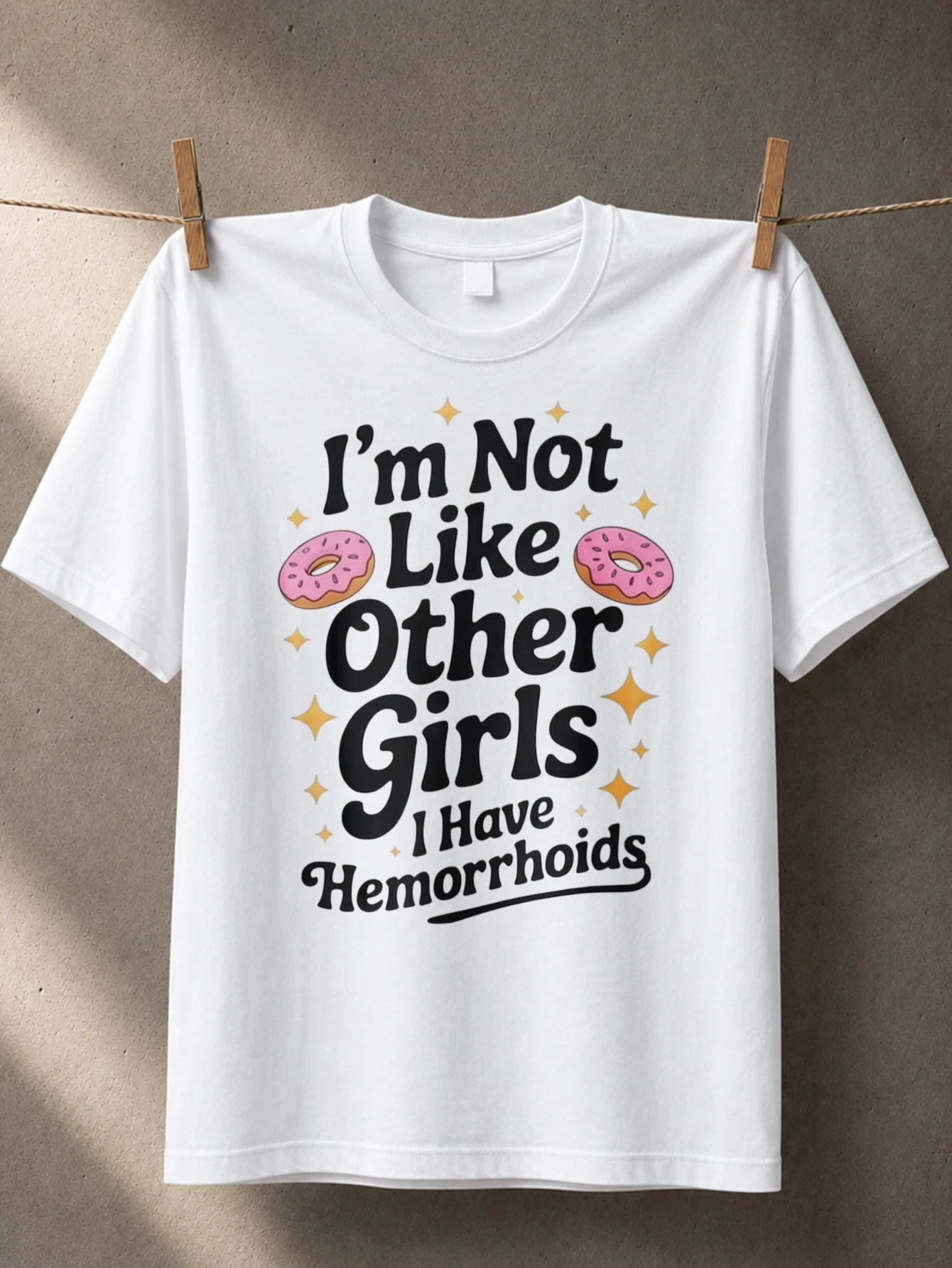 m Not Like Other Girls I Have Hemorrhoids with  rounded text pink donuts and gold star accents  Unisex All T-Shirt