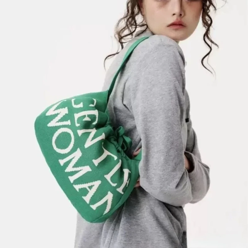

Thailand GENTLEWOMAN knitted models dumpling bag fall and winter fashion commuter drawstring shoulder armpit bag