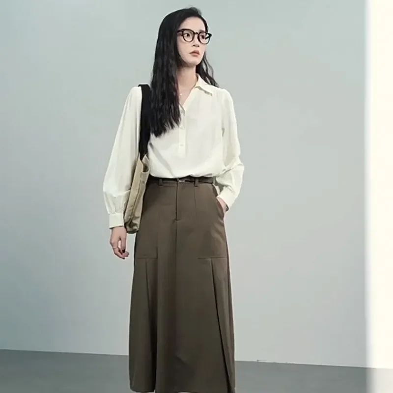 Camisa de cor sólida feminina primavera e verão design casual pulôver solto com decote em v top de manga comprida