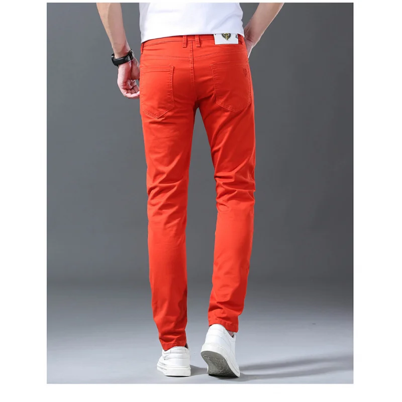 

Orange red spring and summer new jeans men's stretch slim fit small foot trendy brand simple and luxurious casual pants