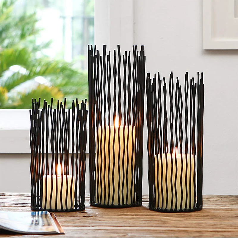 

A set of three metal wire willow candle holders, 8/10/12 inches, used for wedding center, Halloween, and Christmas decoration