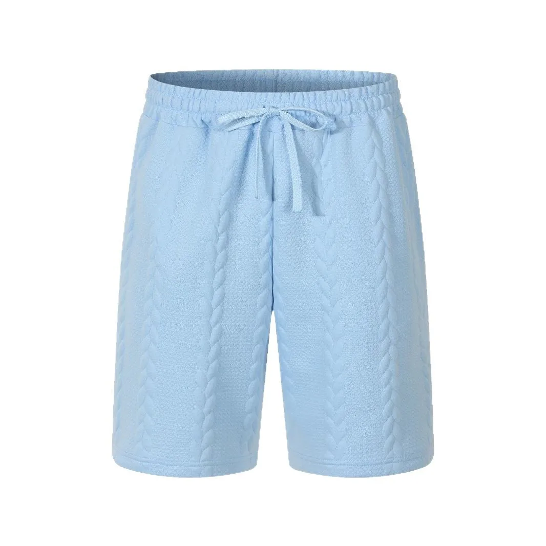 Summer best-selling men's solid-color twisted jacquard casual shorts, with elastic drawstring waistband design and loose fit.