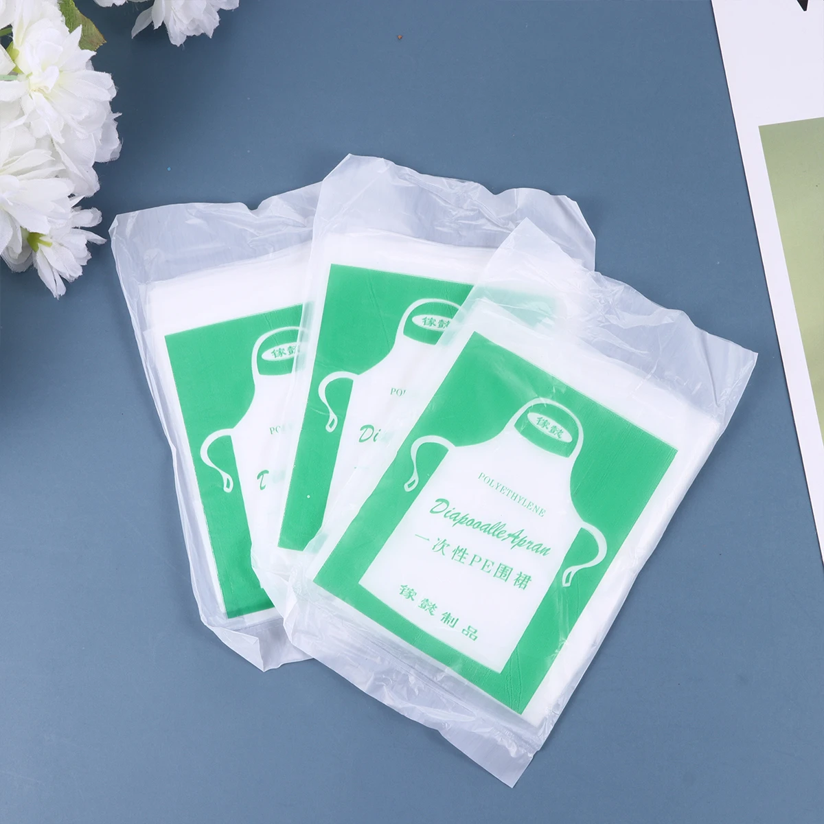 Delantales de plástico desechables impermeables para cocinar, pintar actividades desordenadas, proteger la ropa, portátiles, fáciles de usar, 100 Uds.