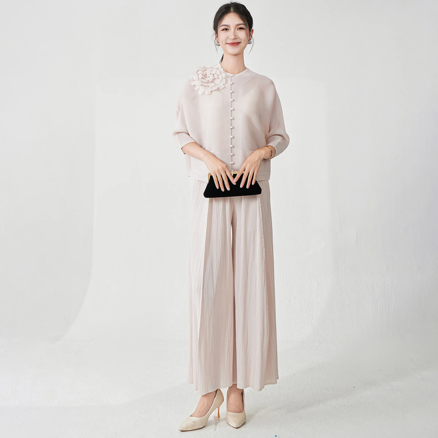 

Wholesale Clothing Women's Fashion Set Designer Stretch Casual Top and Pants Two-Piece Miyake Pleated Set