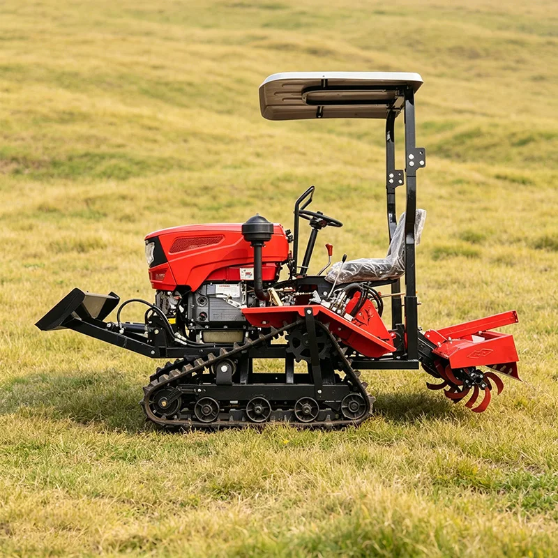 

Многофункциональный мини-трактор на гусеничном ходу с навесным оборудованием: плужная машина, роторный культиватор и микрокультиватор