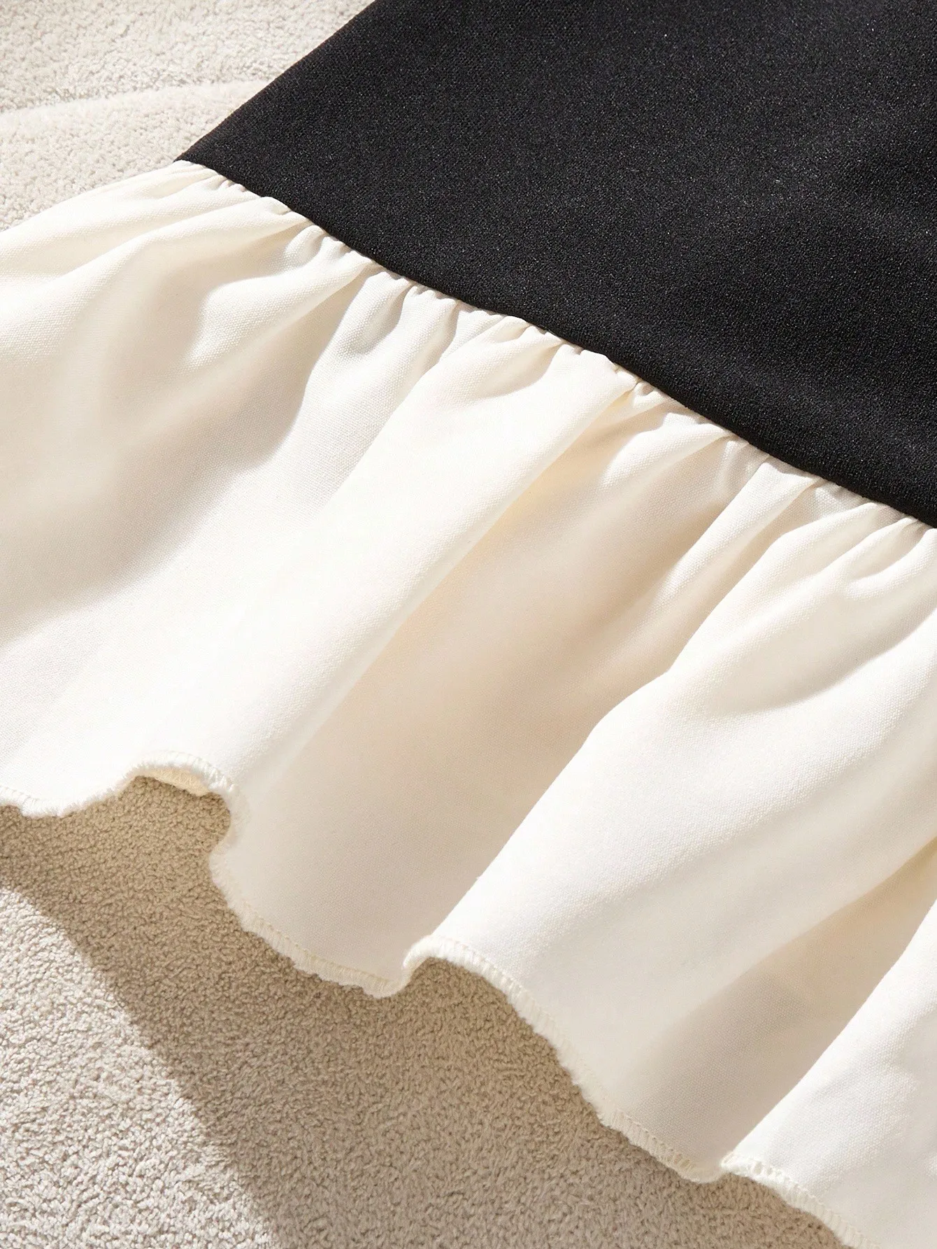 Black & Cream Color Block Dress with Pearl Studs, Bow Neck and Ruffle Hem