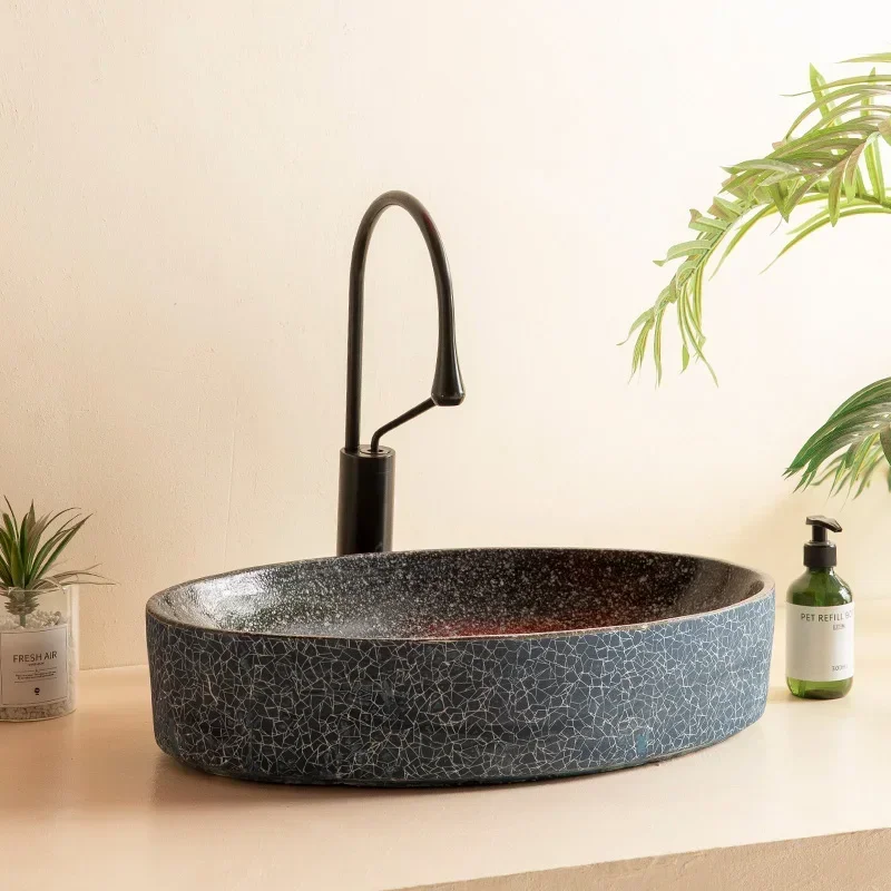 

Oval table basin sink bathroom wash on the table ceramic basin hotel decoration new room decoration bathroom installation