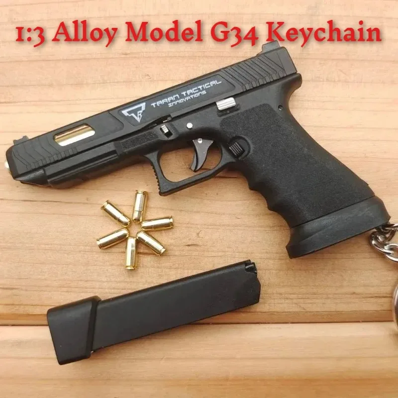 

Newest 1 :3 Alloy G34 with Keychain Pistol Model Ornaments Simulation Detachable Soldier Equipment with Bullets Decorative Toys