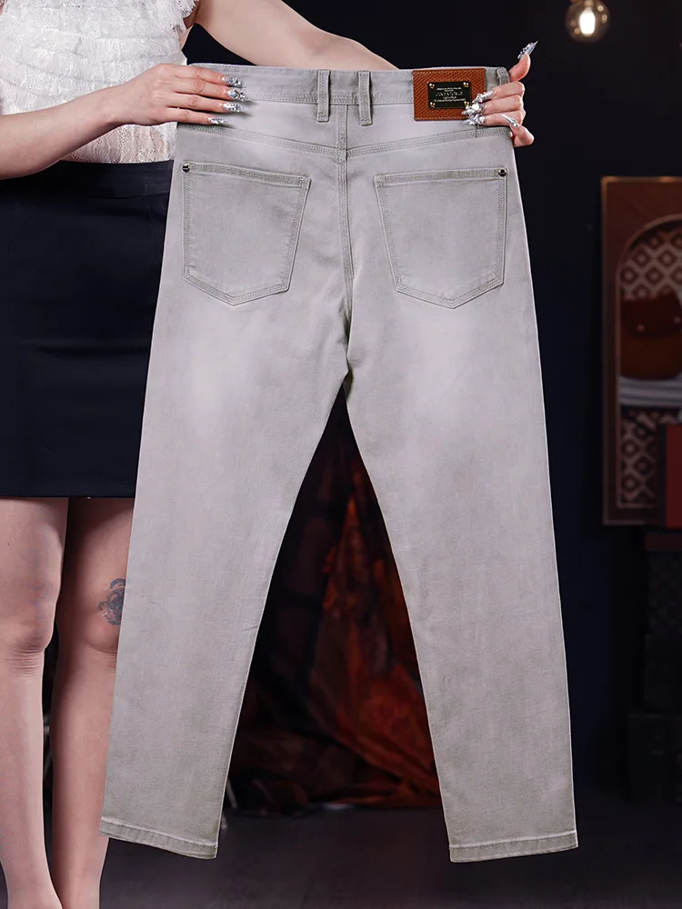 

Summer thin light gray jeans for men, slim fit with small feet, fashionable trend, casual, light luxury pants