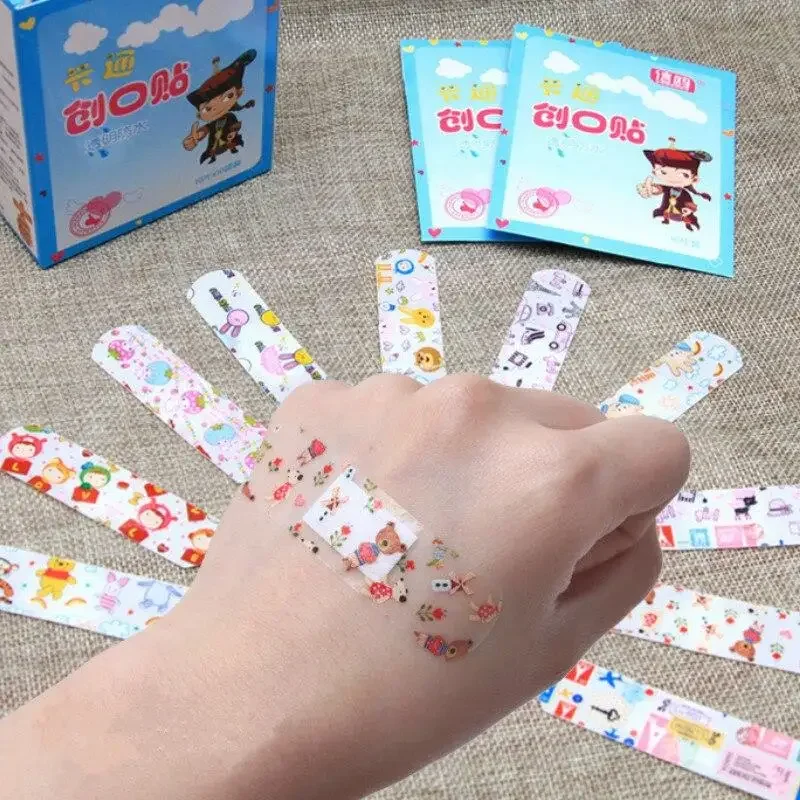 100 adet su geçirmez nefes bant yardım sevimli karikatür BandAids hemostaz yapışkan bandajlar ilk yardım hayatta kalma tıbbi malzemeler