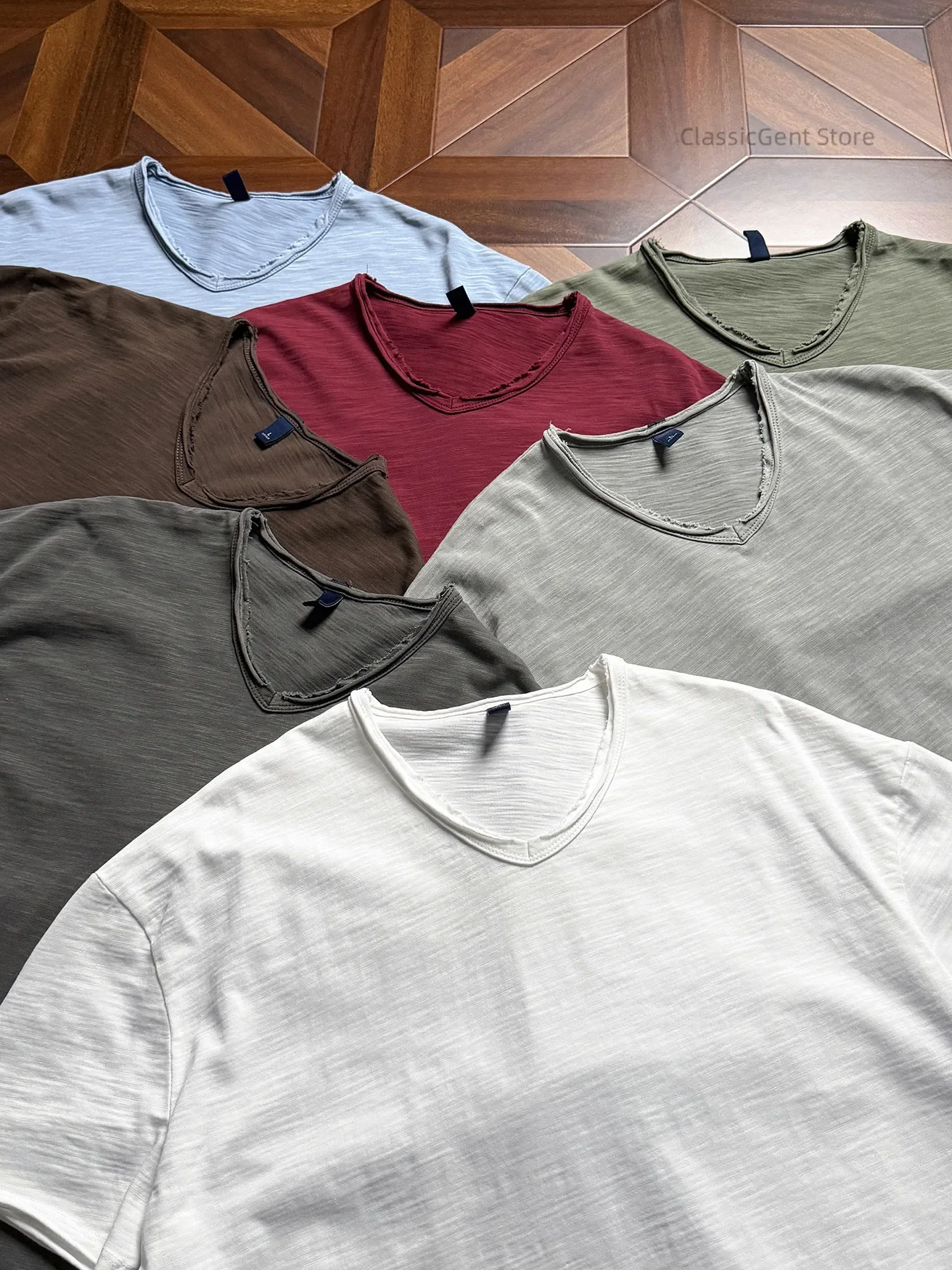 

Customized 9.5OZ pure cotton bamboo fabric, soft and breathable to the touch, non-elastic clean version T-shirt