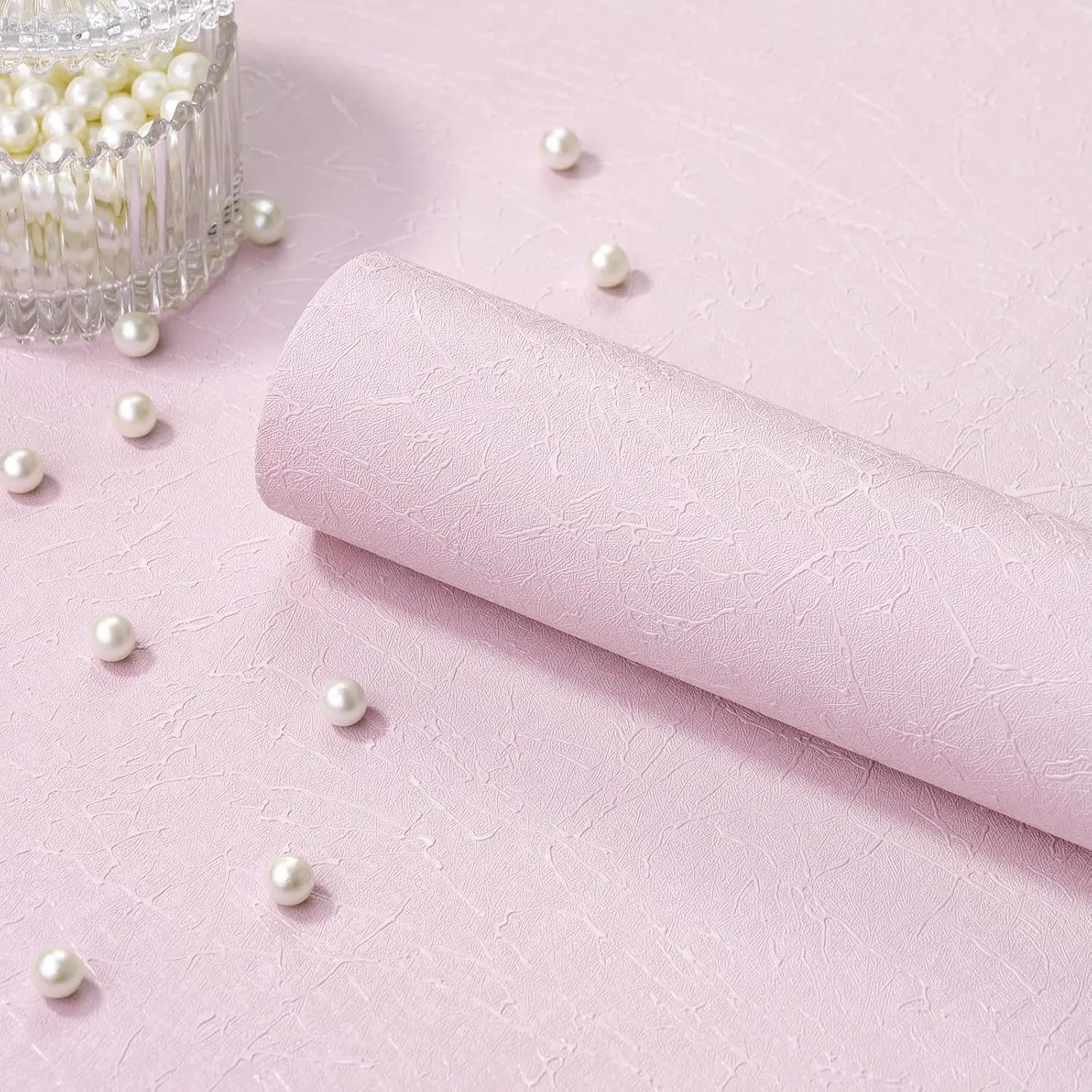 A roll of pink silk peeled removable self-adhesive textured contact paper vinyl decorative wallpaper bedroom living room
