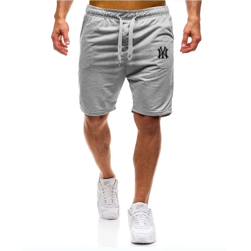 Men New Sports Muscle Fitness Printing Shorts Quickly Drying Breathable Three Quarter Brother Pants Elastic Weight Sweatpants