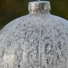 

Christmas debris striped glass ball