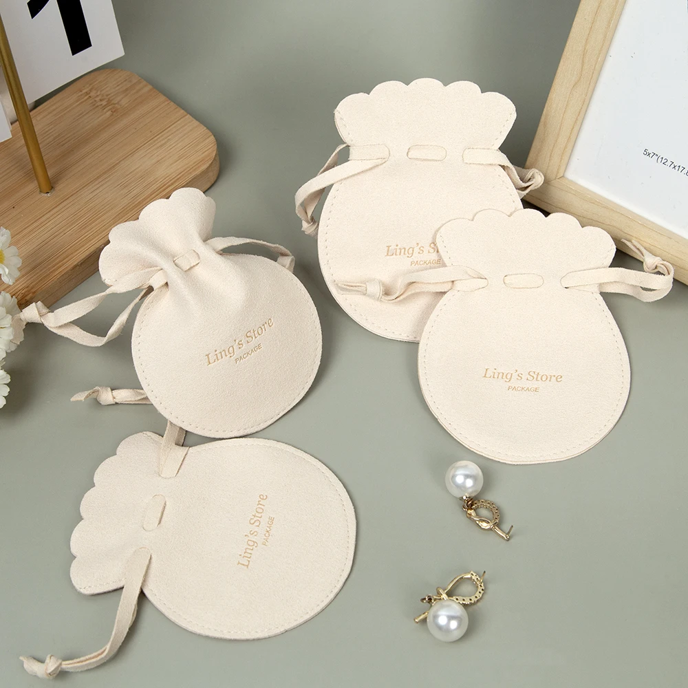 

50/100Pcs Lovely Beige Jewelry Drawstring Microfiber Bags Personalized Print Custom Logo Oil Velvet Pouch Wedding Gift Packaging