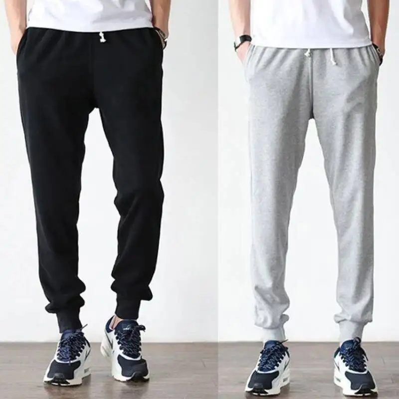 

Весенне-осенние новые мужские брюки, однотонные эластичные брюки на талии, карманы на молнии, модные повседневные свободные спортивные штаны с завязками на ногах