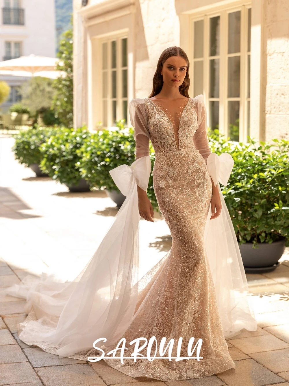 

Luxurious Mermaid Wedding Dress Dreamy Full Lace Beading Sheer Long Sleeves Bow Sexy Deep V Open Back Customized Bridal Gown