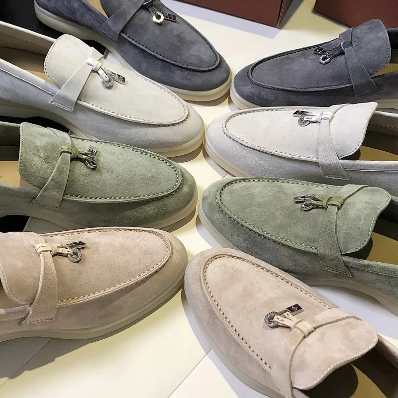 Mocasines informales de piel de ciervo de alta calidad para mujer, zapatos de suela plana con hebilla de borla, para caminar y conducir, novedad de verano