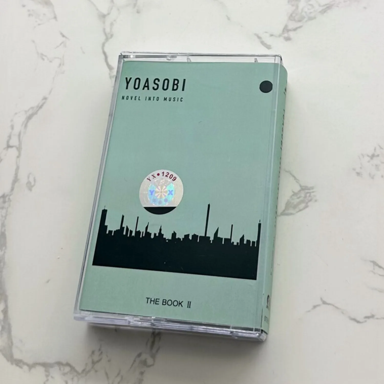 

YOASOBI THE BOOK Ⅱ J-Pop Electropop Novel-Inspired Audio Cassette Tape Retro Analog Sound Collectible for Fans Home Decor