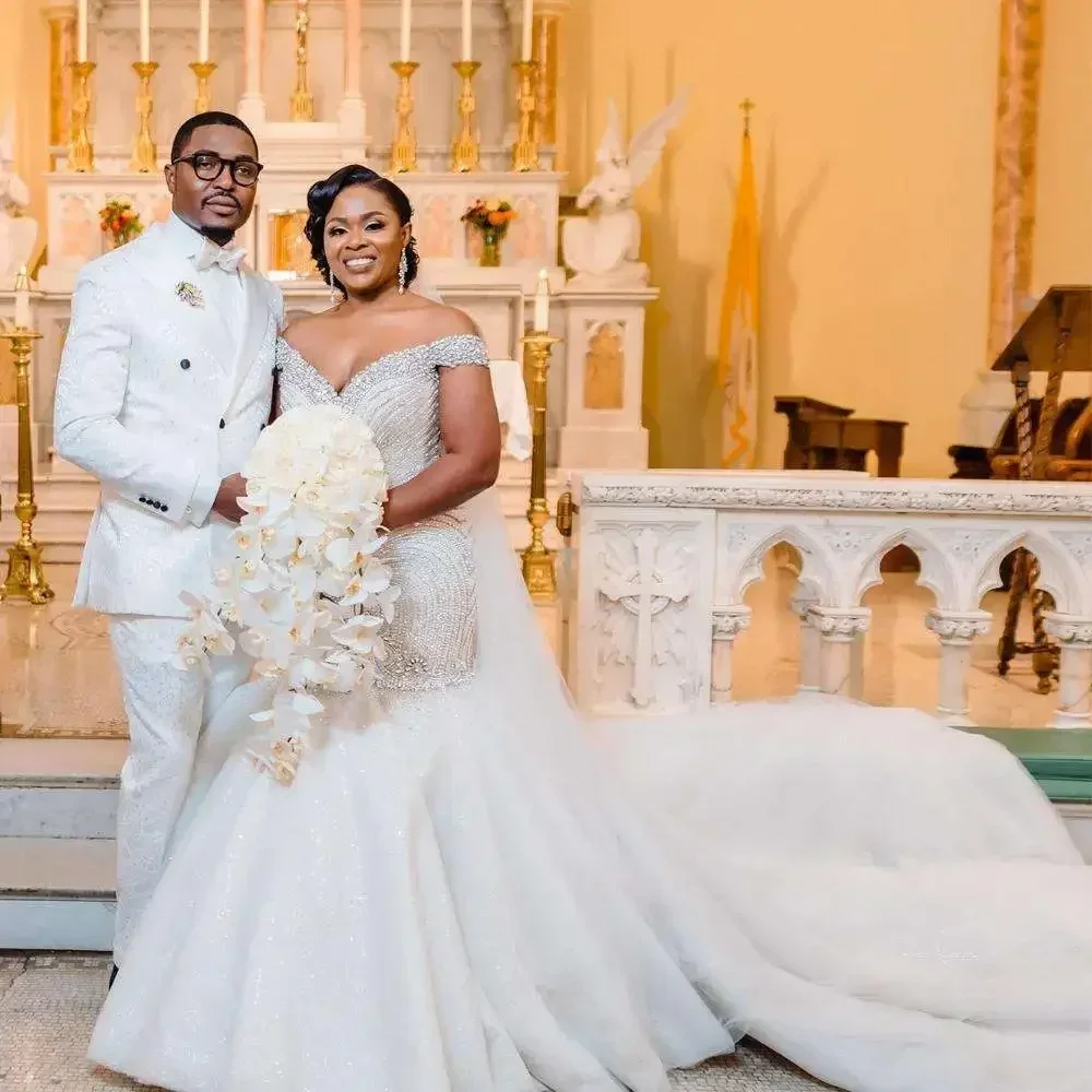 

Customized Crystal African Mermaid Wedding Dresses Chapel Train Off the ShoulderPlus Size Arabic Luxury Beaded Bridal Gowns