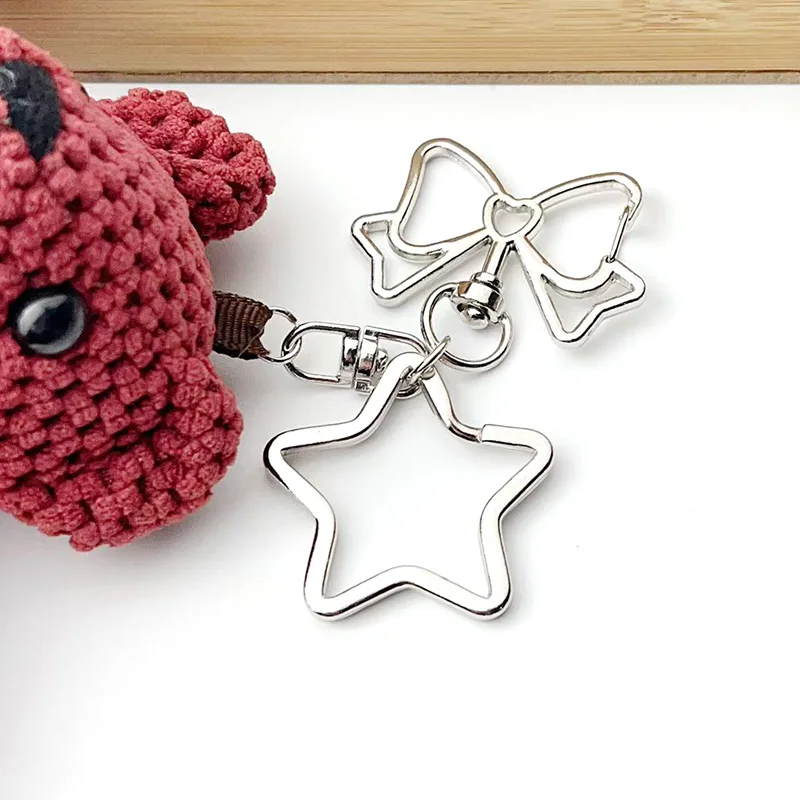 6-12 Stück Bogen Schlüsselanhänger Figur Acht Schnalle Stern Schlüsselanhänger Auswurfsschnalle DIY Spielzeug Schmuck Anhänger Link Herstellung Großhandel – Detail 1