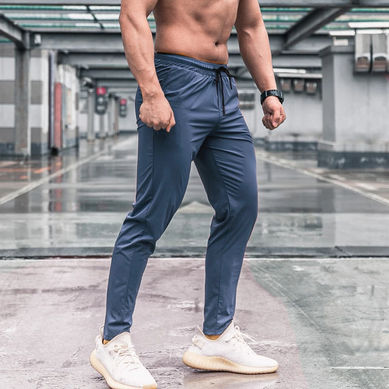 Mannen Sport Broek Met Zakken Running Workout Broek Quick Dry Training Jogger Joggingbroek Hoge Kwaliteit Fitness Bodems