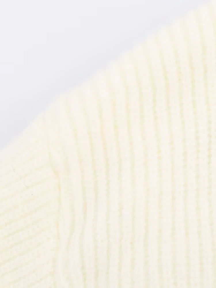 Nuovo abito alla moda da donna in stile europeo con uno stile casual versatile ed elegante, dotato di scollo a V e soffice maglia.