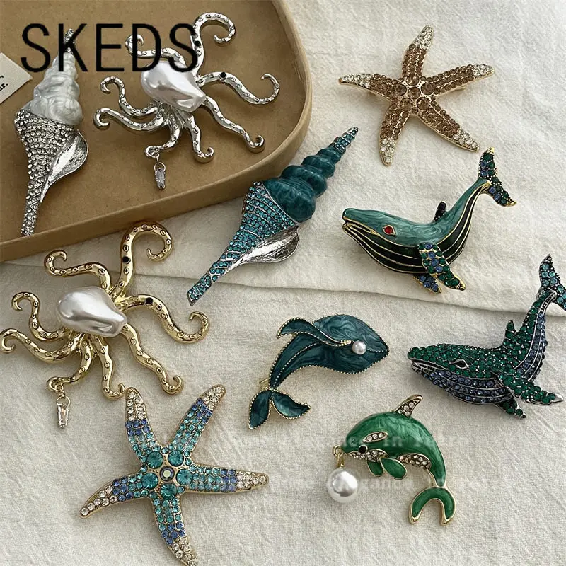 Broche SKEDS en forme de créature marine ornée de strass, broche élégante et vintage en forme de baleine et de coquillage, pour sacs et chapeaux