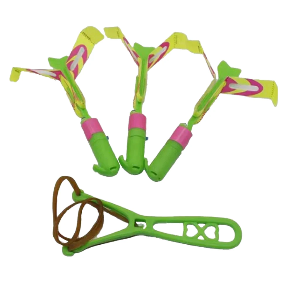 

Slingshots Rocket 10Pcs LED Arrow Helicopters + 10Pcs Launchers Glow in Dark Rocket Helicopter for Kids Boys Girls