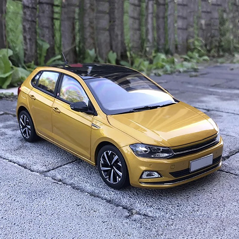 Original de fábrica 1:18 todo nuevo Polo Plus modelo de coche de aleación de nueva generación