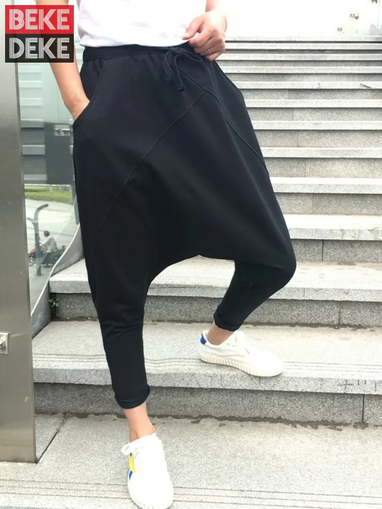 Hip Hop męskie spodnie dresowe z obniżonym krokiem spodnie do kostek ściągane sznurkiem luźny krój wiosna lato mężczyźni Streetwear spodnie haremowe