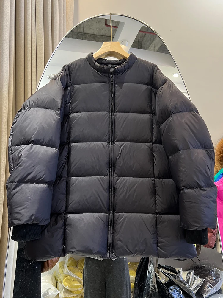 سترة نسائية ذات تصميم كوري متوسطة إلى طويلة ورقبة دائرية فضفاضة وسميكة وبسيطة #4