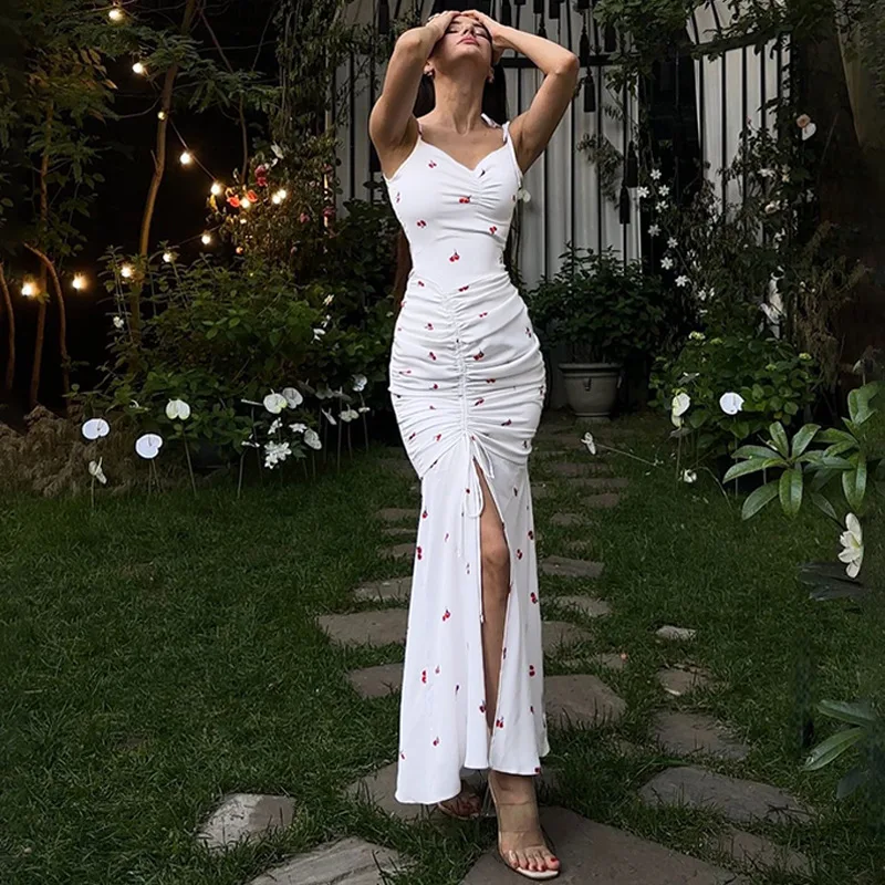 

2025 Summer Europe and America New Women's Fashion Casual Printing Sling Sexy Wrinkle Split Temperament Dress.