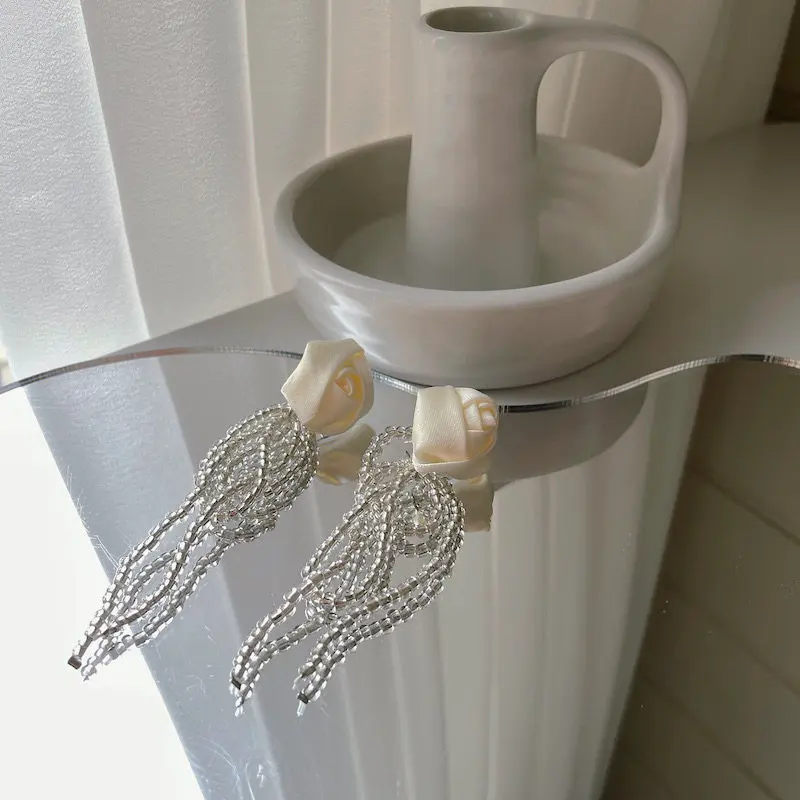 Rose tassel white silk satin rose flower crystal earrings string Japanese and Korean new high-end ear clips women