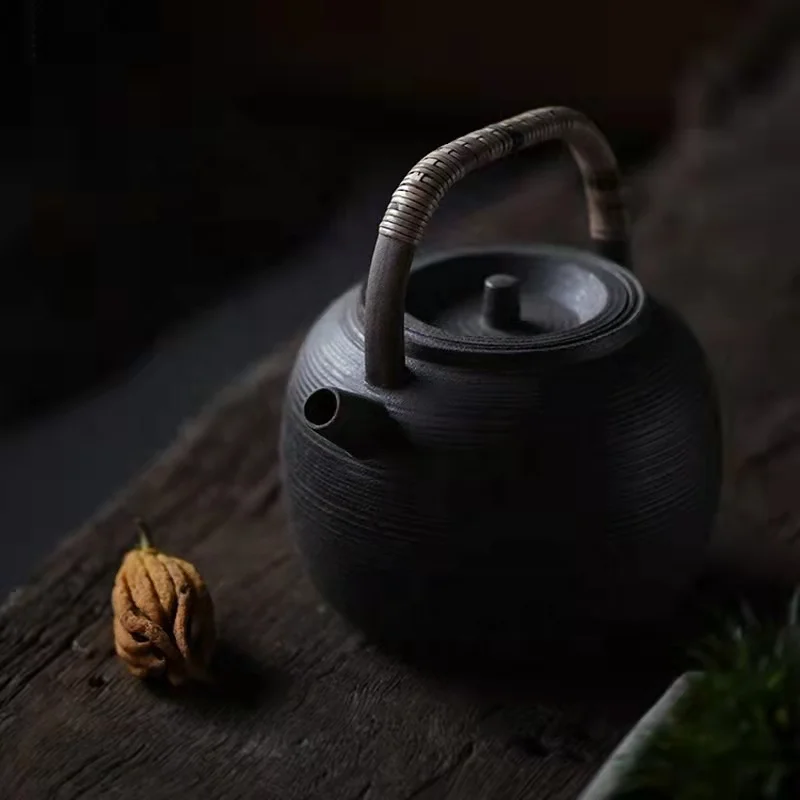 

Chinese ancient style soda glazed Mingquan hand-made that can whistle hand-boiled tea kungfu teapot