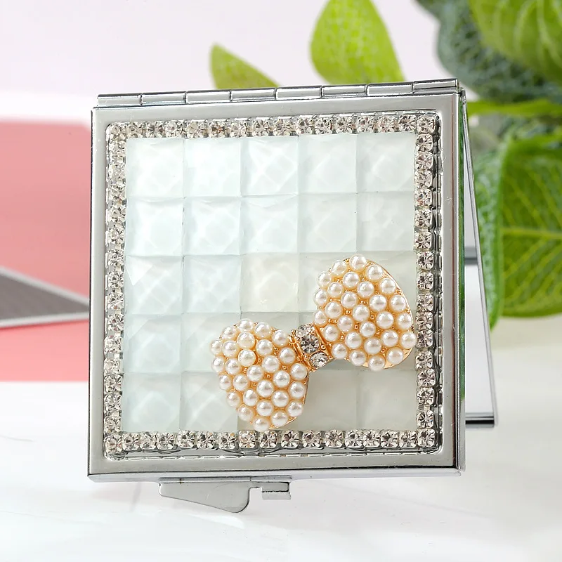 Luxury Metal Small Makeup Mirror with Diamond Fragrant Pearl Bow Princess Mirror Double-sided Folding Portable Makeup Mirror