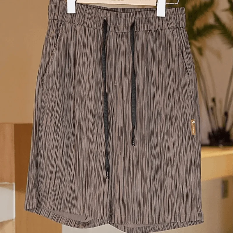 超薄型アイスシルクメンズショーツ夏カジュアル伸縮性速乾性五分丈ビーチパンツ通気性ルーズフィット若者スタイル