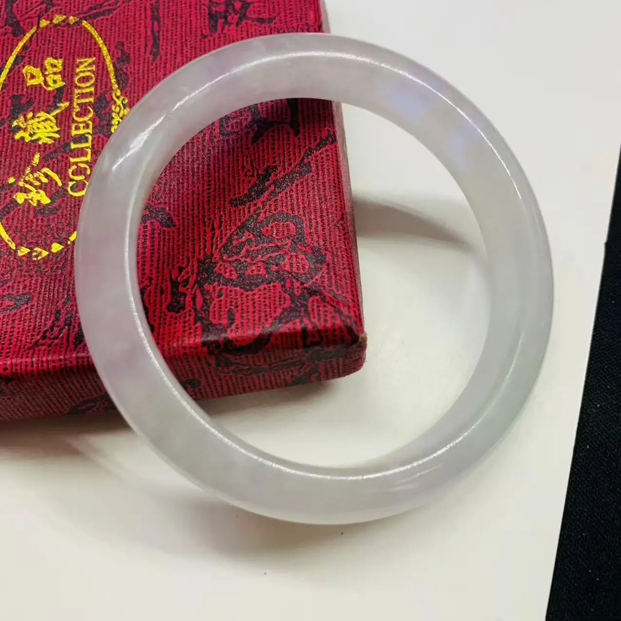 

56.7mm natural jadeite light purple jade bracelet photographed in real life