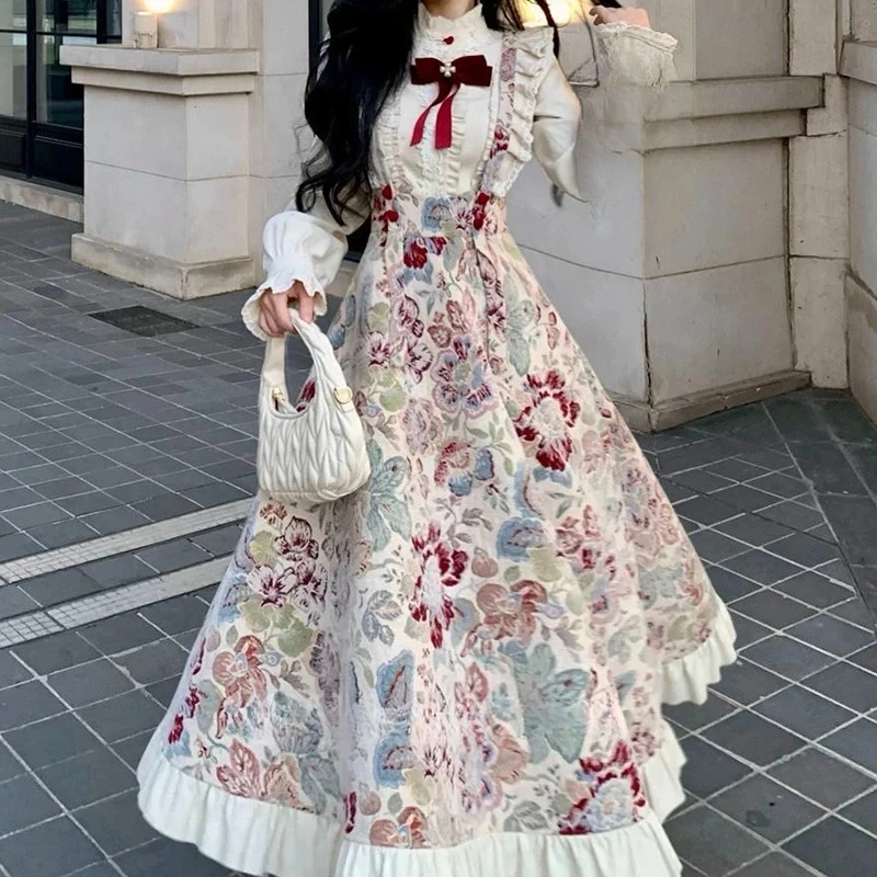 

French retro gentle ruffled shirt women's spring and autumn new thickening with long-sleeved floral jacquard strap skirt suit.