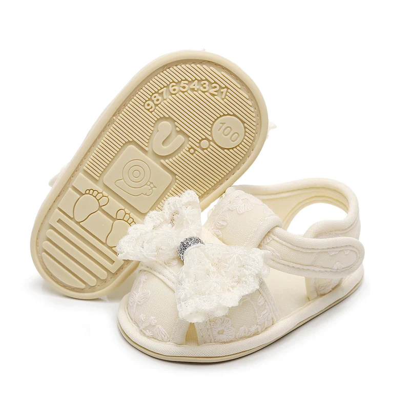 Sandales d'été pour bébés filles de 0 à 18 mois, chaussures plates à nœud papillon/volants, semelle coordonnante, chaussures de premiers pas pour tout-petits