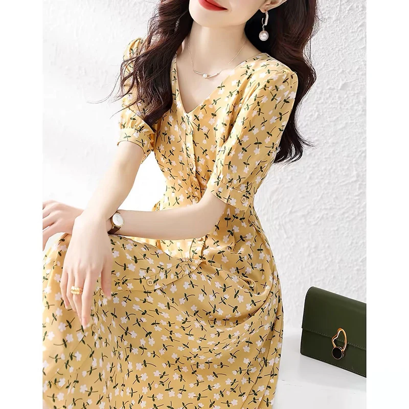 Mode V-Ausschnitt Knopf gedruckt Bandage Puff ärmel Blumen kleid Damen bekleidung Sommer neue lose Büro Dame elegantes Kleid