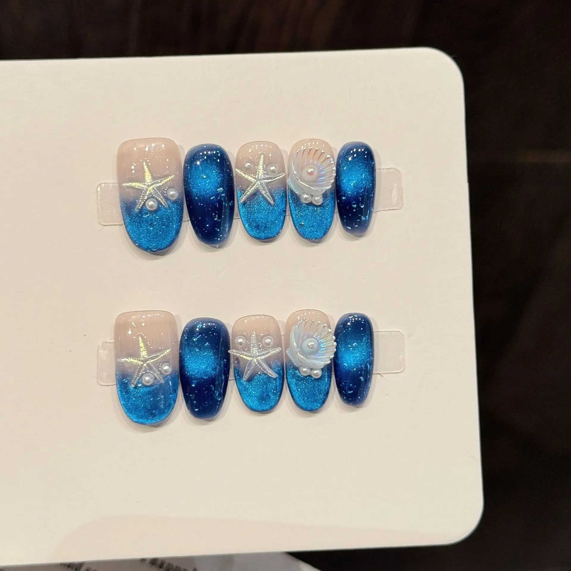 

10pcsHandmade Short Oval Press On Nails Deep Blue Cat Eye Sea Star Shell Pearl Design Fake Nails Wearable Nails Art Tip For Girl
