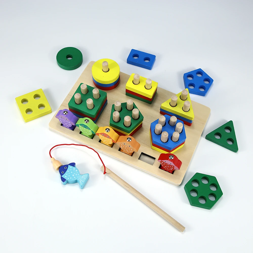 

Деревянная рыболовная установка с детскими геометрическими фигурами в сочетании с строительными блоками для раннего образования и игрушка-головоломка.