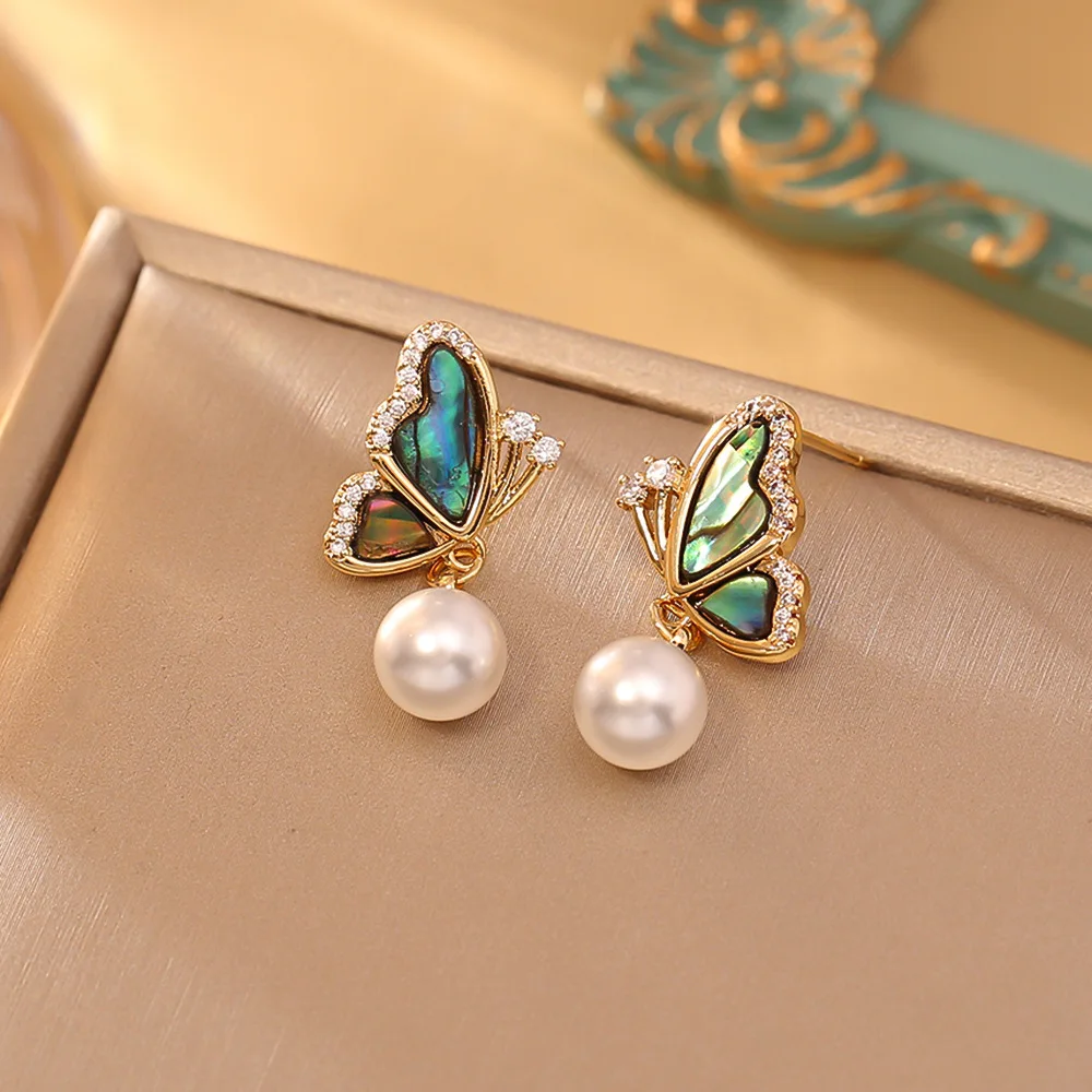 Fantasy colorful mother-of-pearl butterfly pearl earrings niche high-end retro earrings silver needle zircon earrings for women