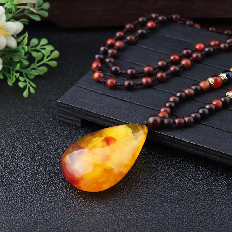 

DIY accessories New second-generation beeswax pendant, sweater chain, imitation amber long necklace, women's wooden Buddha beads