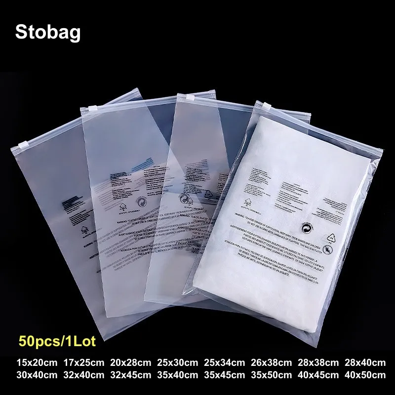 StoBag 50pcs Transparent Zipper Bags with Worning Words Clothes Packaging Pouch Clear Plastic Sealed Shirts Storage Reusable