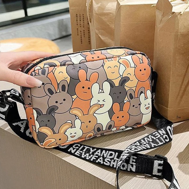 

Fashion Cartoon Bunny Print Crossbody Bag with Wide Printed Strap, Casual Nylon Shoulder Purse for Daily Teens Use Wallets